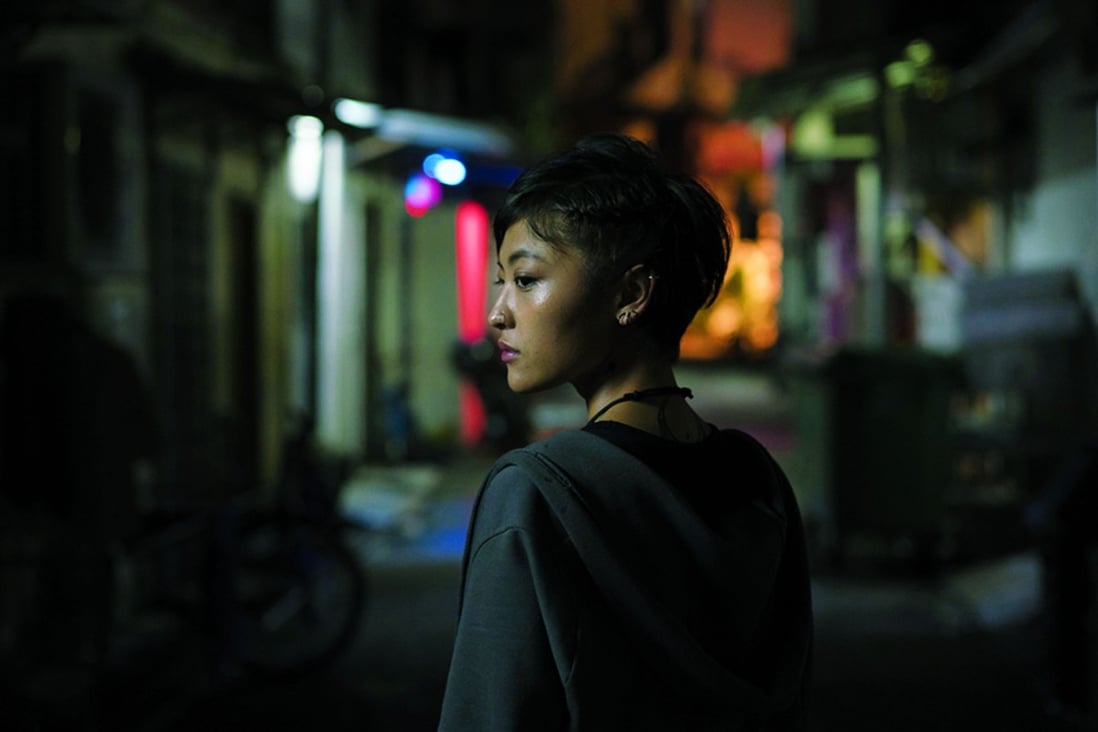 Chinese actress Luna Kwok in the film ‘A Land Imagined’, which sheds light on the precarious existence of Singapore’s migrant workers. Photo: AFP