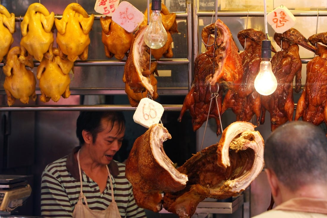 Li Bao Ge specialises in siu mei (roasted meats) like those seen here, hanging in a shop at Bowrington Road Market, Wan Chai, Hong Kong. Photo: Felix Wong