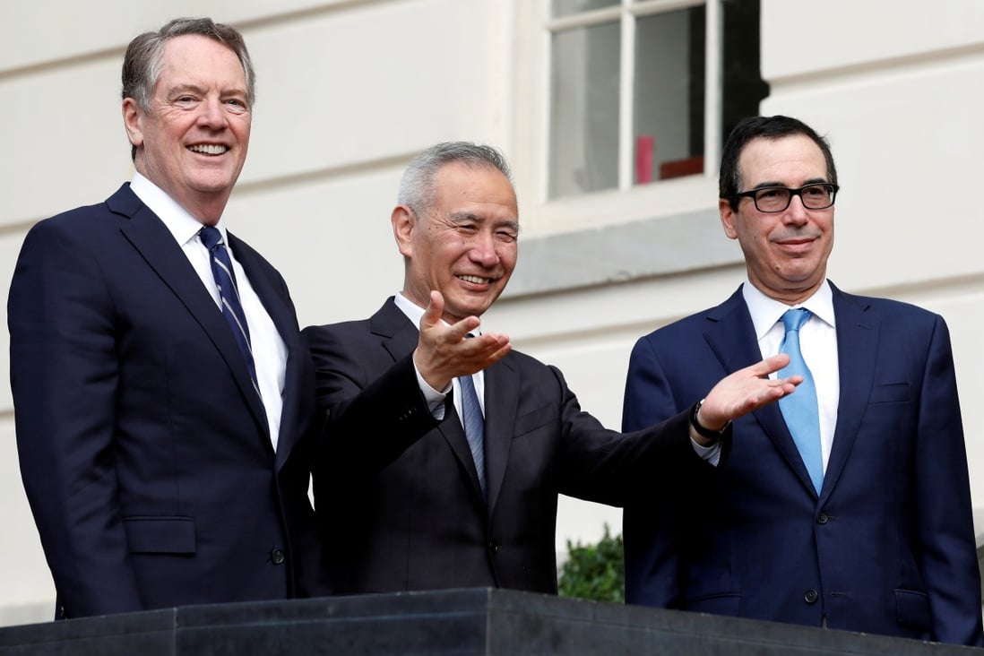 China's Vice-Premier Liu He gestures to the media between US Trade Representative Robert Lighthizer (left) and Treasury Secretary Steven Mnuchin before trade negotiations in Washington on October 10. Photo: Reuters