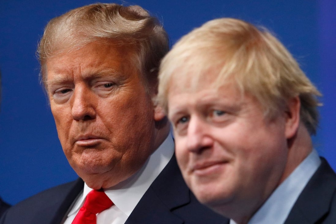Britain’s Prime Minister Boris Johnson (right) welcomes US President Donald Trump to the Nato summit at the Grove Hotel in Watford, northeast of London, on December 4. Photo: AFP