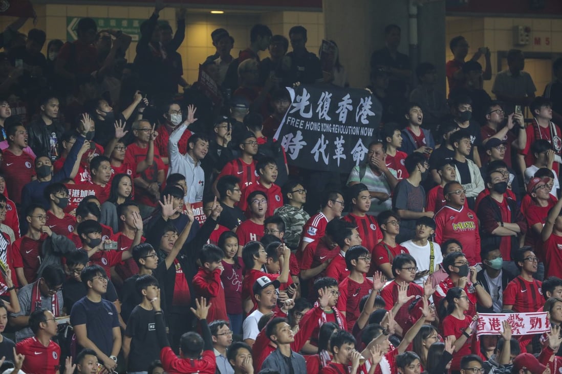 Hong Kong fans hold up a banner during the World Cup qualifier against Bahrain in November. Photo: May Tse