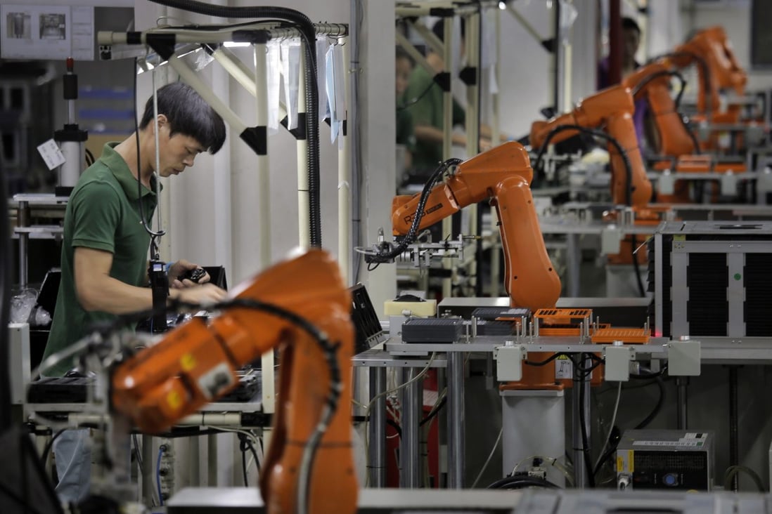 China’s official manufacturing PMI was 50.2 in December, with anything above 50 signalling growth in the sector. Photo: AP