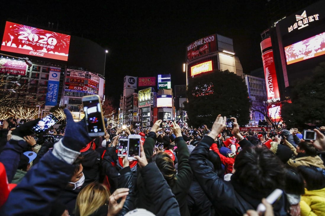 People gather at Tokyo’s Shibuya crossing during the 2020 New Year's celebrations. The Japanese government plans to introduce a new law aimed at boosting local competitiveness, while fending off Chinese influence in hi-tech infrastructure like 5G mobile networks. Photo: dpa