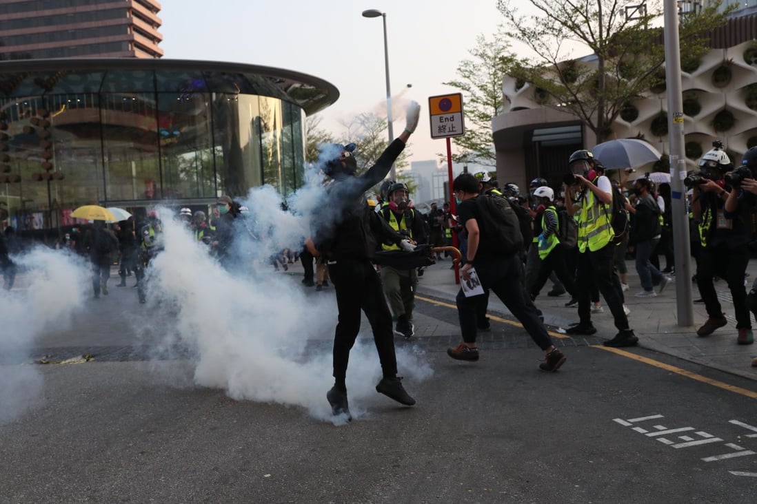 Police fired tear gas at anti-government protesters in Tsim Sha Tsui, Hong Kong in December 2019. Photo: Sam Tsang