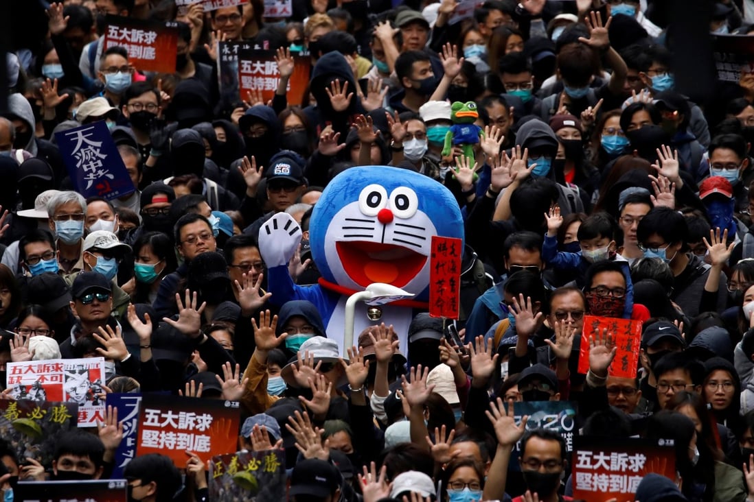 A person dressed as anime character Doraemon attends an anti-government rally in Hong Kong on New Year’s Day. Photo: Reuters