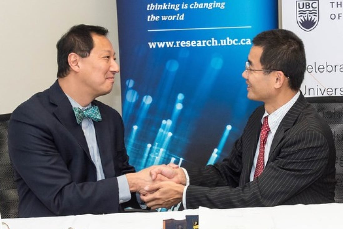 UBC President Santa Ono (left) and Huawei Canada Research President Christian Chua sign a 2017 deal for Huawei to provide C$3 million in umbrella funding to UBC researchers. Photo: CNW Group/Huawei Canada
