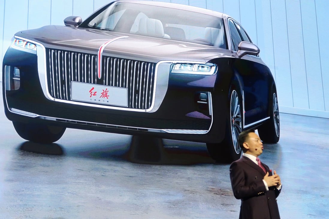 Xu Liuping, chairman of state-owned FAW Group, speaks at an event of Chinese car marque Hongqi, or Red Flag, held at the Great Hall of the People in Beijing, on January 8. Photo: Reuters