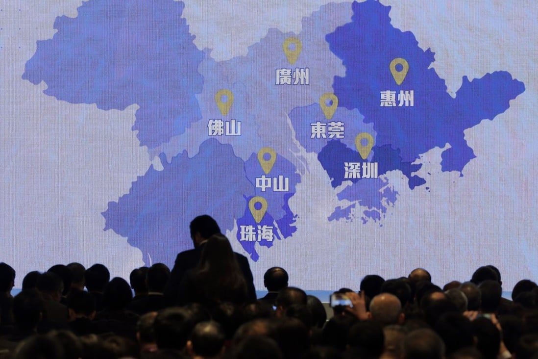 A screen shows a map of Greater Bay Area, linking up Hong Kong and Macau with 9 other cities is set to shift the Southern China from traditional manufacturing into a world-class hi-tech economic powerhouse to rival the Silicon Valley and Tokyo's Bay Area. Photo: AP