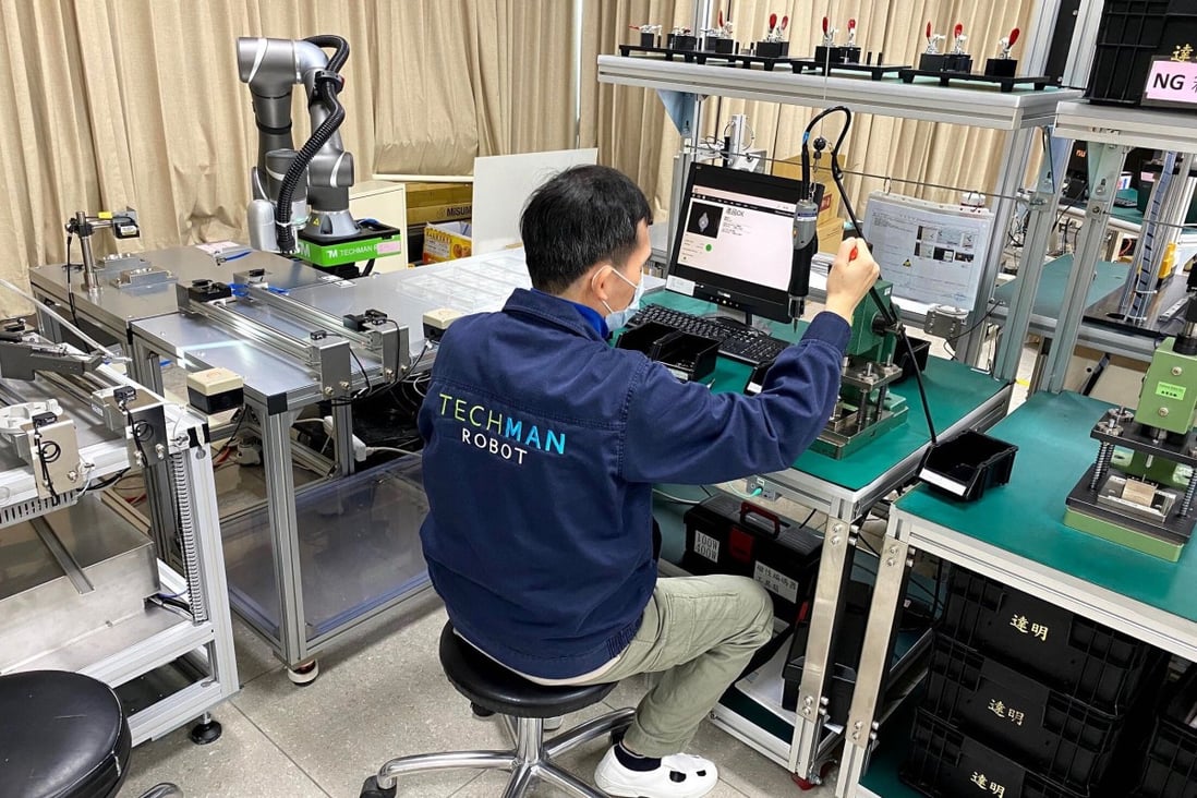 Taiwan's government has been pulling out the stops to lure hi-tech companies back from China, in what has become a key part of its economic agenda. Robot maker, Techman, has been helping its parent company Quanta Computer return to Taiwan. Photo: Cissy Zhou
