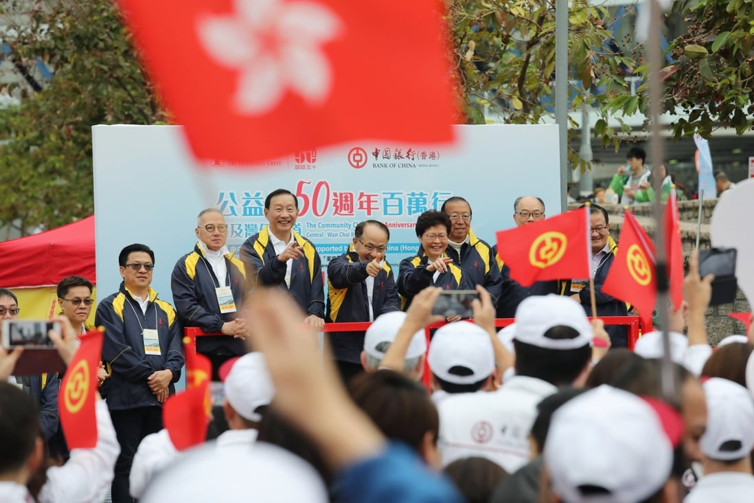 Wang Zhimin, director of the Liaison Office in Hong Kong and Carrie Lam Cheng Yuet-ngor, Chief Executive of Hong Kong, at the Community Chest’s 50th Anniversary Walk for Millions event in January 2019. Wang has been replaced while Lam’s popularity has sunk amid protests: Photo: Felix Wong