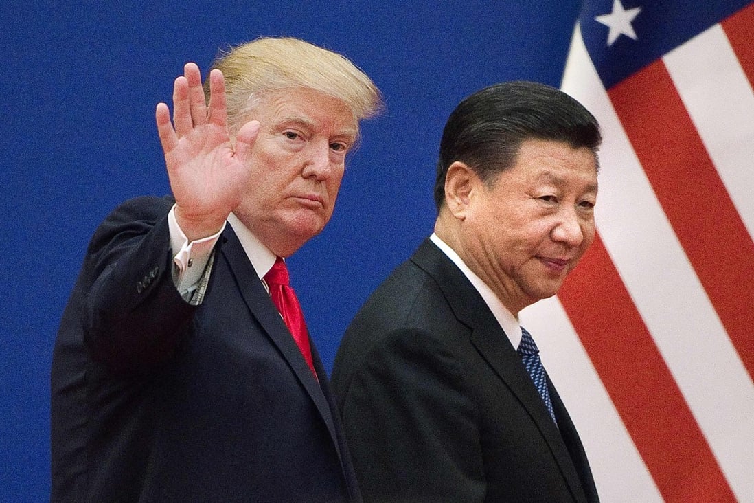 US President Donald Trump and China's President Xi Jinping leave a business leaders event at the Great Hall of the People in Beijing. Photo: AFP