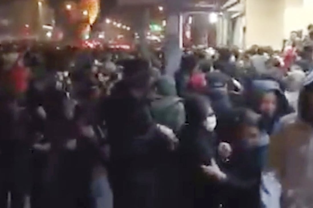 This image made from a Sunday, January 12, 2020, video provided by the New York-based Centre for Human Rights in Iran, shows police firing tear gas into a crowd near Azadi Square as police broke up a demonstration in Tehran. Photo: AP