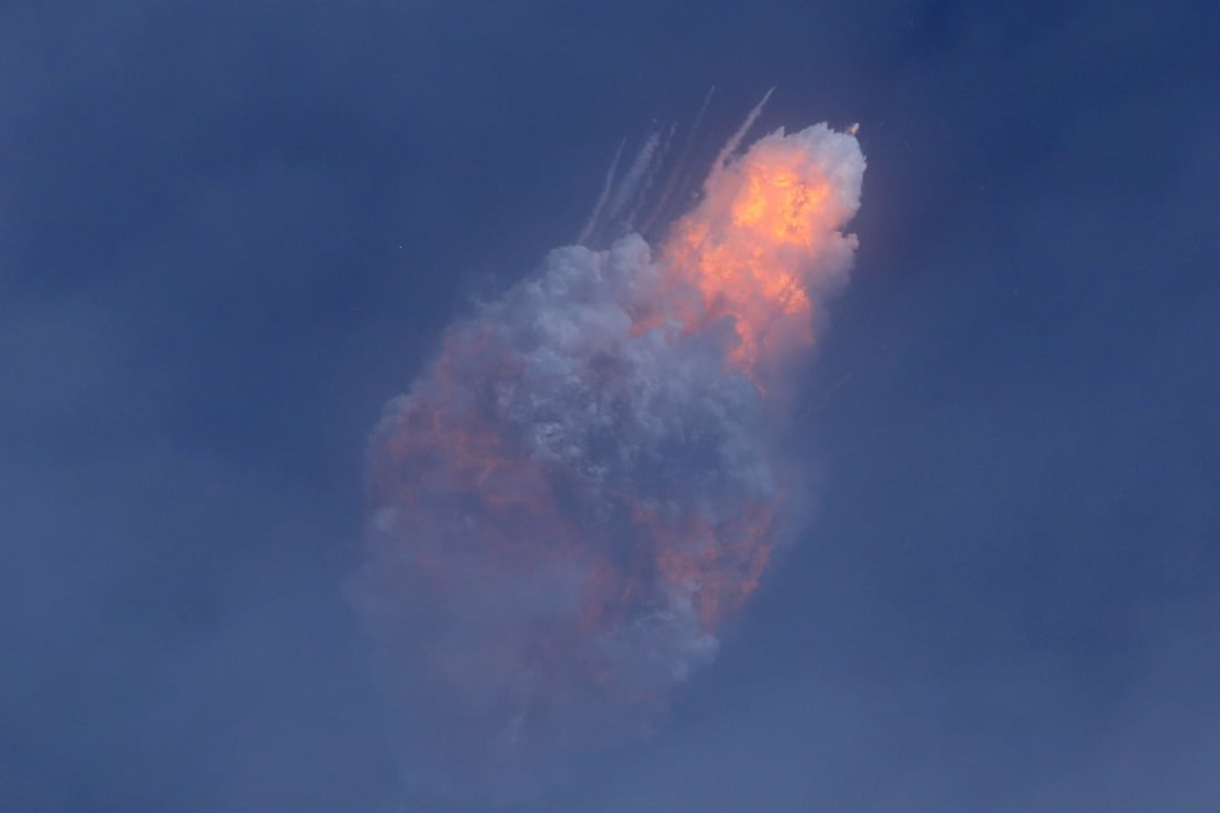 A SpaceX Falcon 9 rocket engine self-destructs after jettisoning the Crew Dragon astronaut capsule during an in-flight abort test. Photo: Reuters