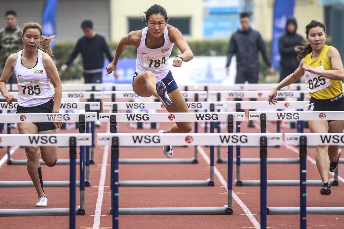 Vera Lui wins the first race of the season to qualify for next month’s Asian Indoor Championships in the women’s 60m hurdles. Leung Ching-yi (yellow) finishes second, while Shing Cho-yan comes third at Wan Chai Sports Ground. Photo: Dickson Lee