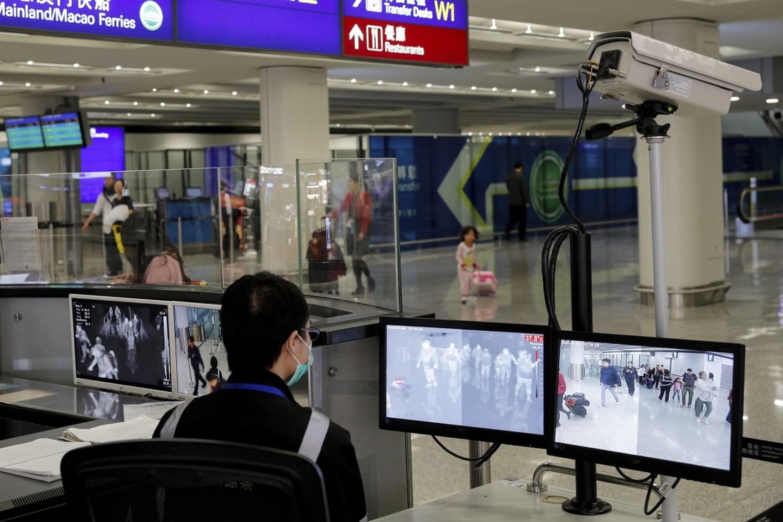 Passengers at the airport who have taken direct flights from Wuhan will need to fill in health forms. Photo: AP