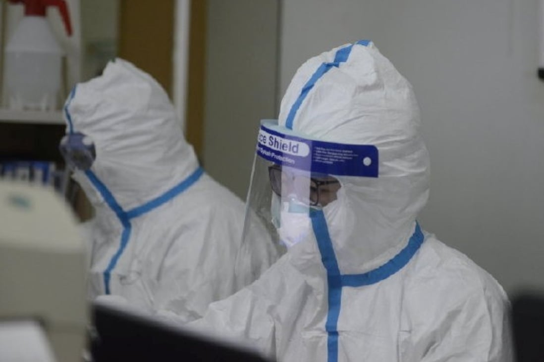 Medical staff in protective gear at Wuhan’s central hospital. Photo: Reuters