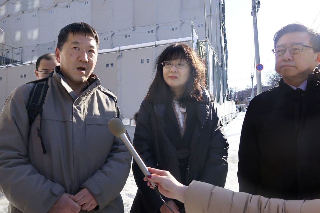 Hibiki Momose (centre), a Hokkaido University of Education professor, leads a group in the submission of a petition to the Chinese consulate general asking it to help bring back Chinese scholar Yuan Keqin, whose whereabouts have been unknown for more than six months. Photo: Kyodo