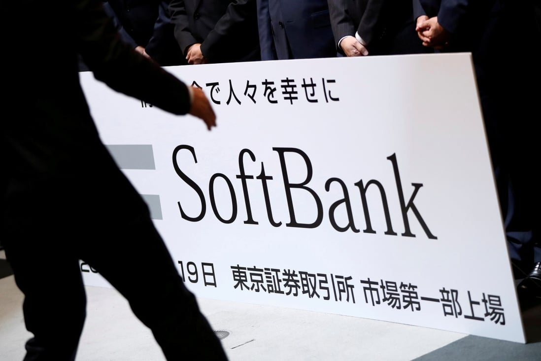 A SoftBank Corp placard is prepared during a ceremony to mark the company's debut on the Tokyo Stock Exchange in Tokyo, Japan December 19, 2018. Photo: Reuters