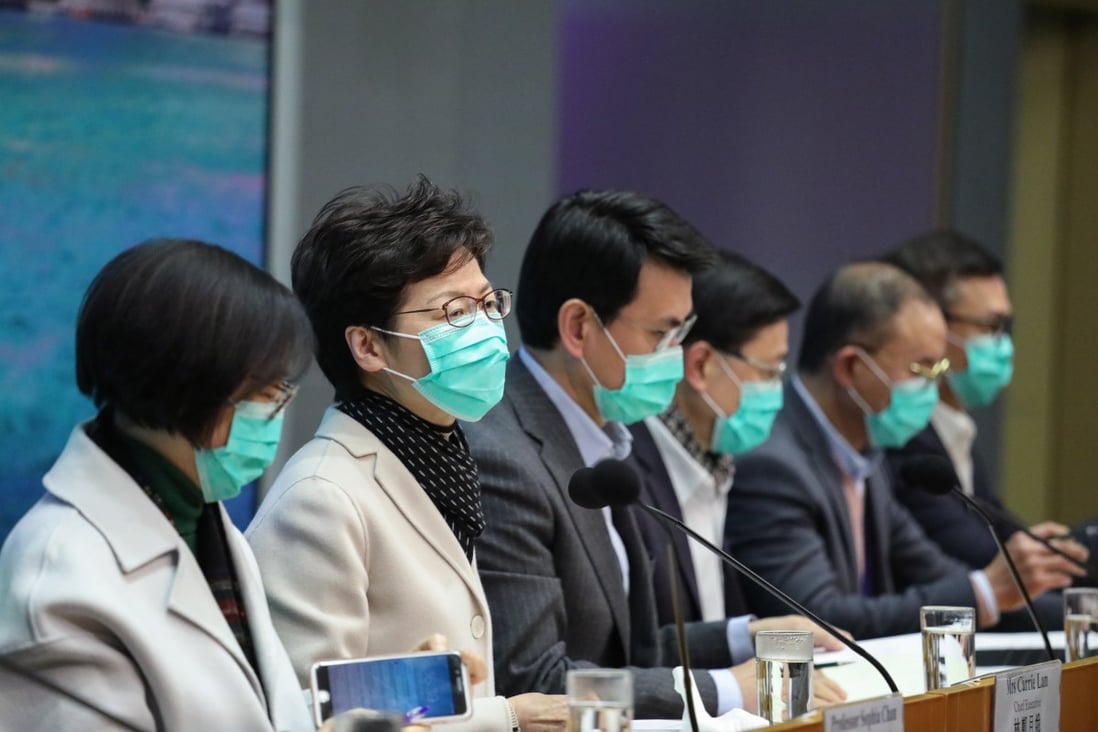 Chief Executive Carrie Lam and her team explain the latest measures. Photo: Nora Tam