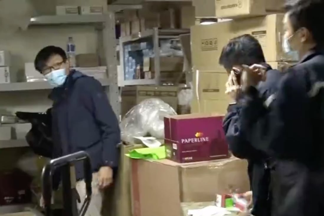 Thieves made off with 25,000 surgical masks from an online store in a warehouse at Wah Fai Industrial Building in Yau Tong. Photo: Cable TV