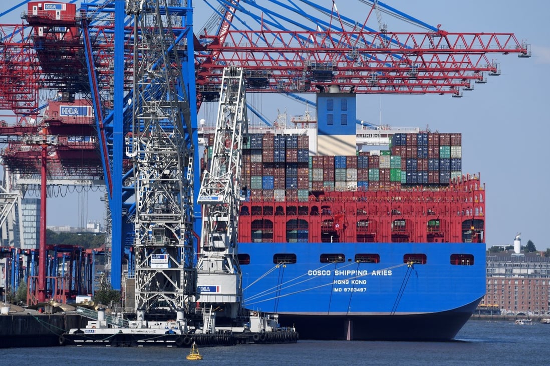 A Chinese Cosco container ship unloads at the port of Hamburg in Germany in July 2018. Photo: Reuters