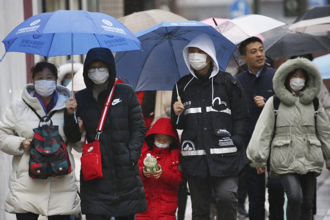 Tourists in Tokyo were taking precautions as the number of coronavirus infections worldwide approached the global total for the Sars outbreak. Photo: AP