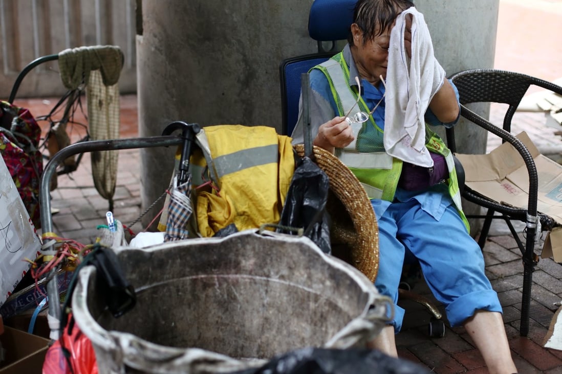 Calls for street cleaners to get better protective gear, as rest of Hong Kong hunkers down for