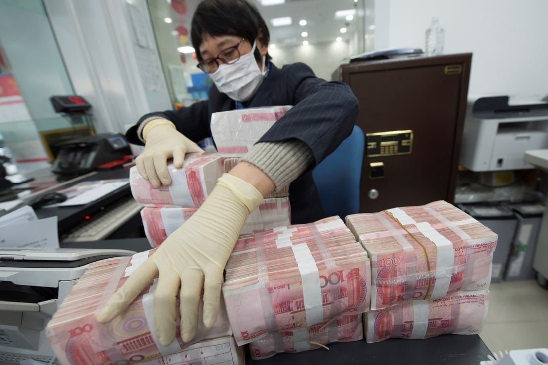 The People’s Bank of China (PBOC) said on its website that it was lowering the seven-day reverse repo rate to 2.40 per cent from 2.50 per cent, and cutting the 14-day tenor to 2.55 per cent from 2.65 per cent previously. Photo: Reuters