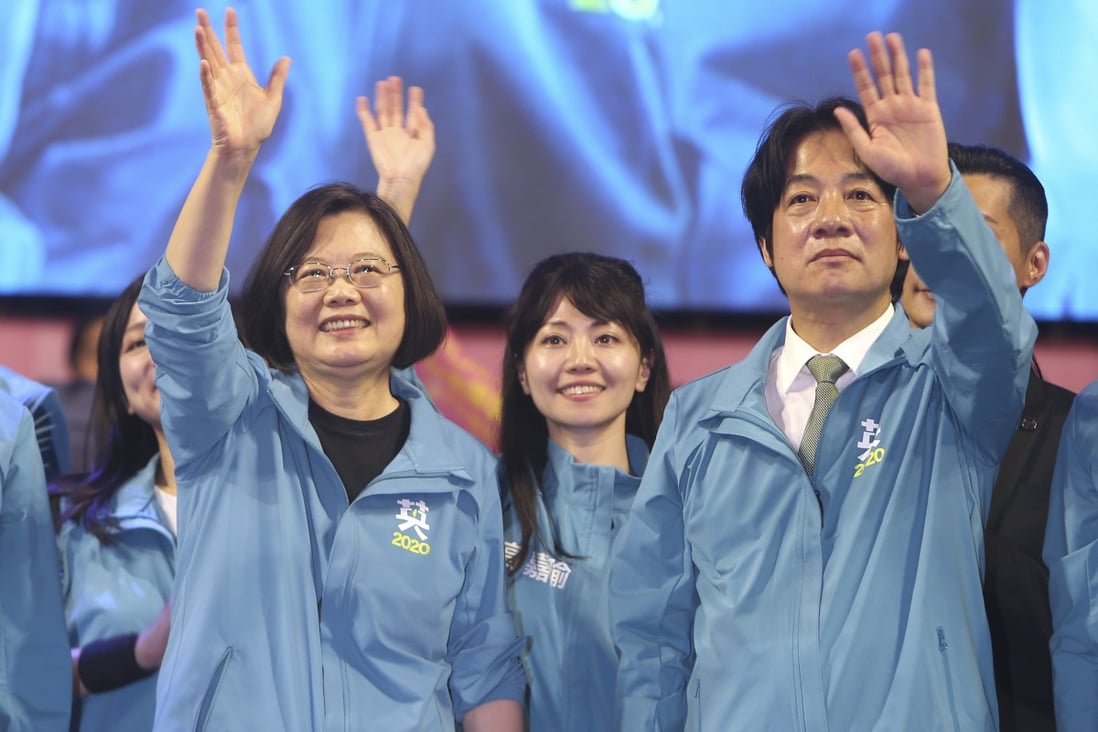 Democratic Progressive Party presidential candidate Tsai Ing-wen (left) and running mate William Lai Ching‑te (right) join supporters at an election rally in Taipei last month. Photo: AP