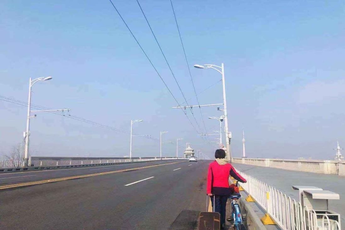 Xu undertakes a three-hour journey home through Wuhan by bike and foot, after going as far as she could on public transport. Photo: Handout