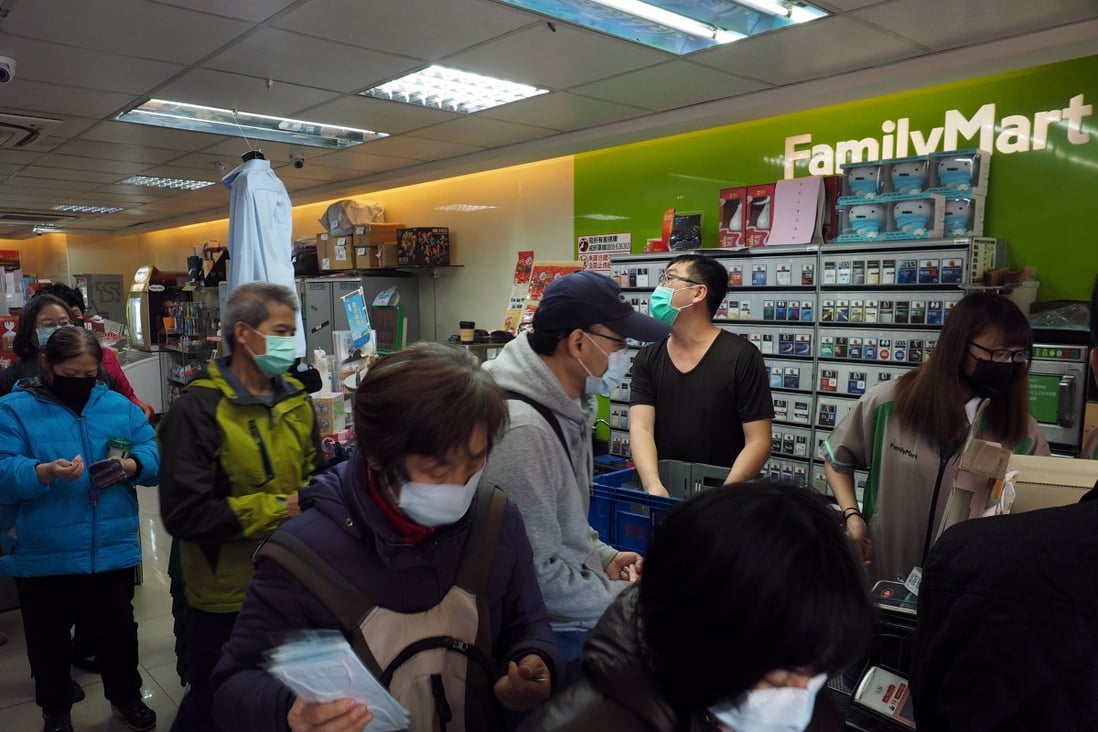 People buy face masks in a shop in Taiwan, where only 10 confirmed cases of the new coronavirus have been reported. Photo: EPA-EFE