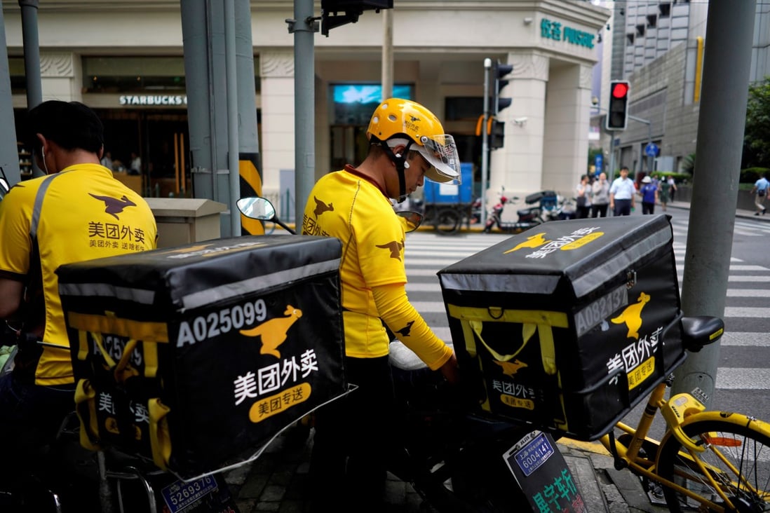 Drivers of food delivery service Meituan are seen in Shanghai, China in 2018. File photo: Reuters