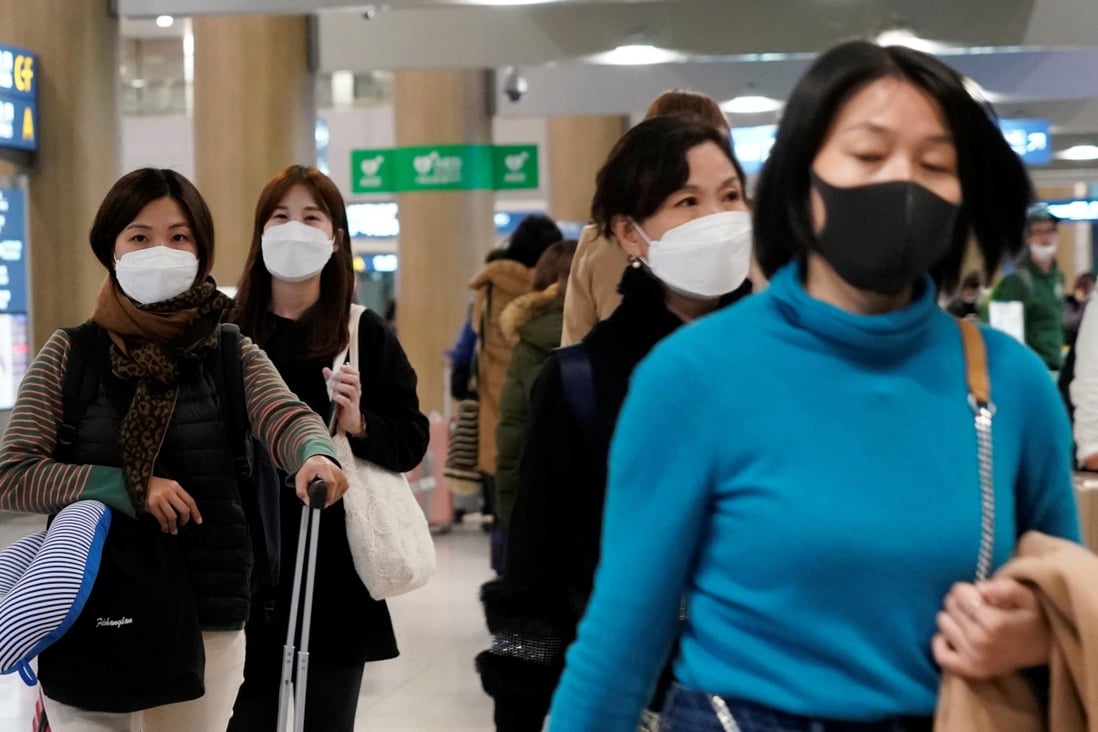 People seen at South Korea’s Incheon International Airport in protective face masks on January 3, 2020. File photo: Reuters
