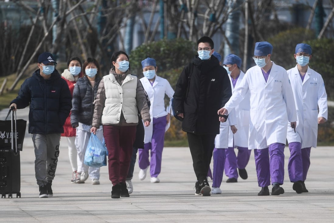 Cured coronavirus patients leave hospital in Hangzhou, one of four cities in the eastern Chinese province of Zhejiang which has adopted draconian quarantine measures for its residents. Photo: Xinhua