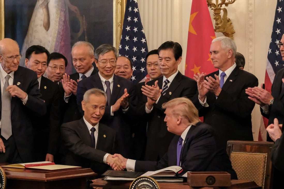 US President Donald Trump and Chinese Vice-Premier Liu He signed the phase one trade deal in January. Photo: EPA