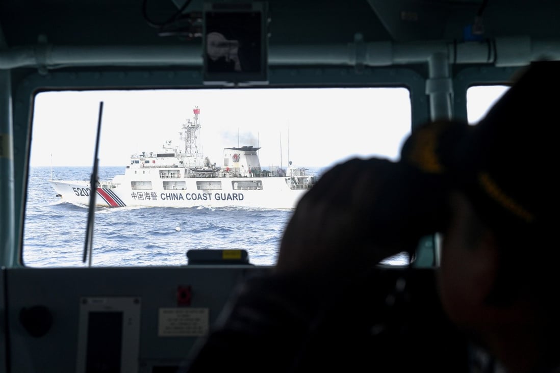 A Chinese Coast Guard vessel is seen from an Indonesian naval ship during a patrol in Indonesia’s exclusive economic zone north of its Natuna Island, on January 11. Photo: Reuters