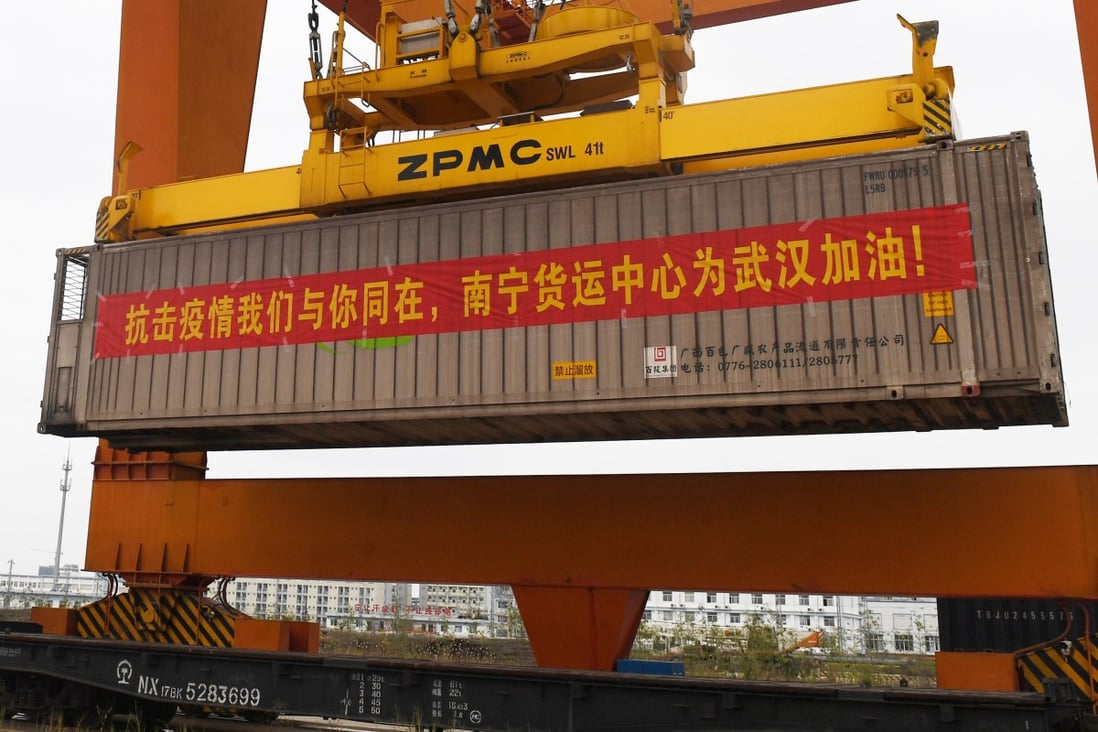 A container carrying supplies for virus-hit Hubei Province is lifted at a railway port. Photo: Xinhua