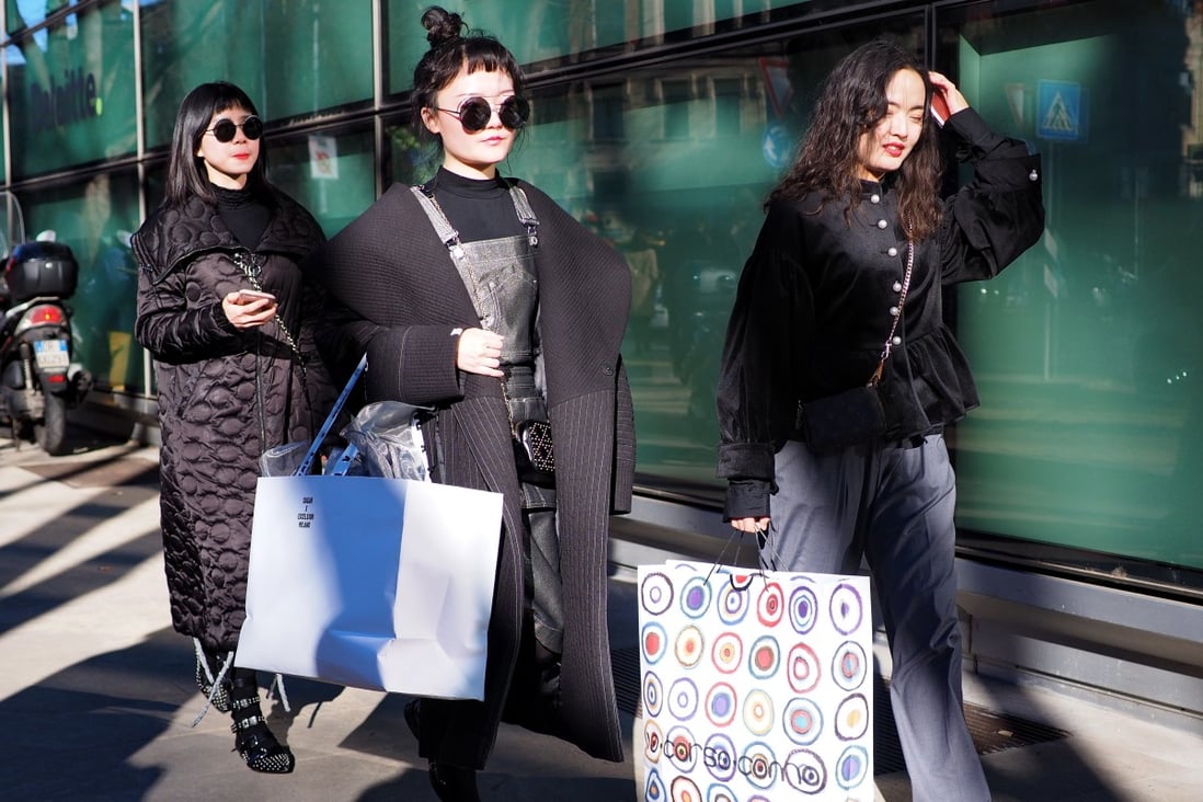 Asian fashion bloggers fit in some shopping while attending fashion week in Milan last spring. The absence of fashion influencers, buyers and editors because of the coronavirus outbreak, and logistical problems it has caused, will keep six Chinese designer labels away from Paris Fashion Week this spring. Photo: Shutterstock