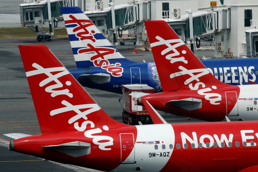 AirAsia planes sit on the tarmac at Kuala Lumpur International Airport, Malaysia. Photo: Reuters