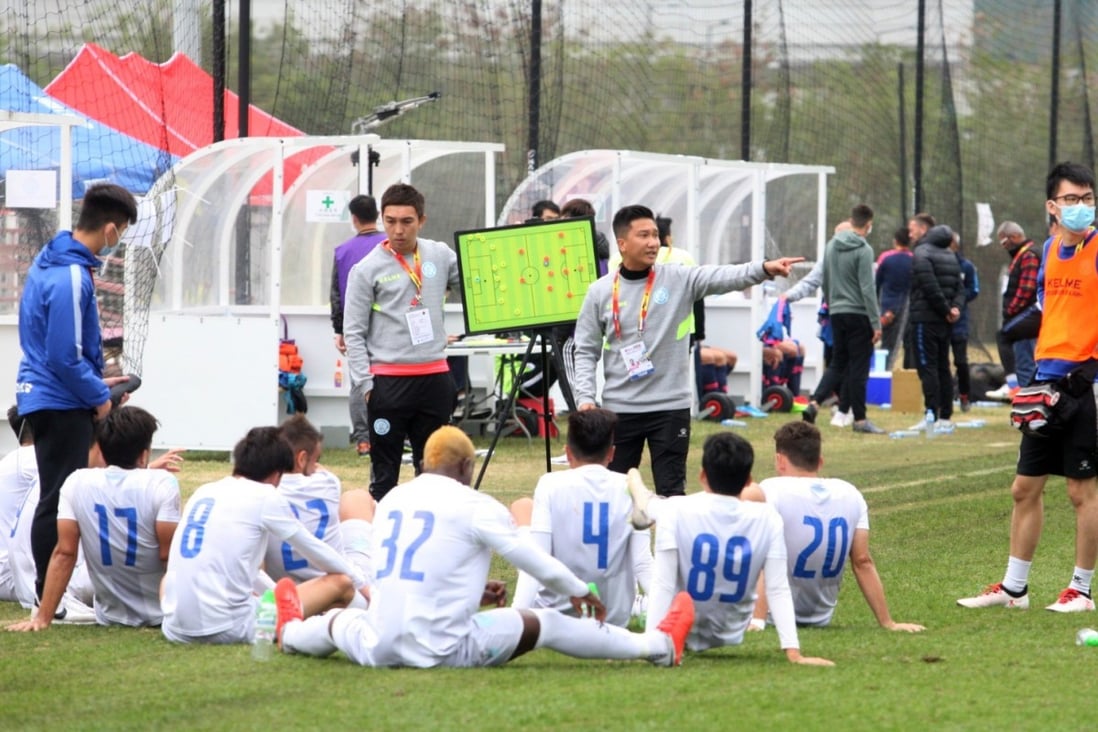 BC Rangers conduct their half-time talk on the pitch because the changing rooms at Tseung Kwan O Training Centre are too far away. Photo: Chan Kin-wa