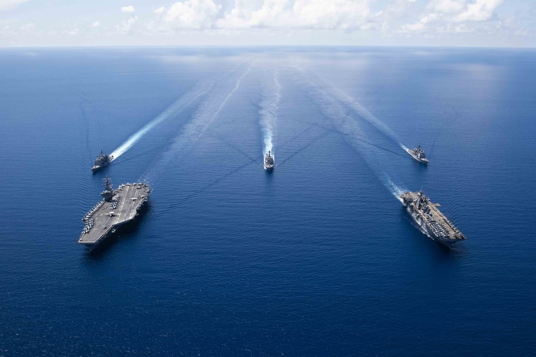The aircraft carrier USS Ronald Reagan and ships from its strike group in the South China Sea. Photo: AFP