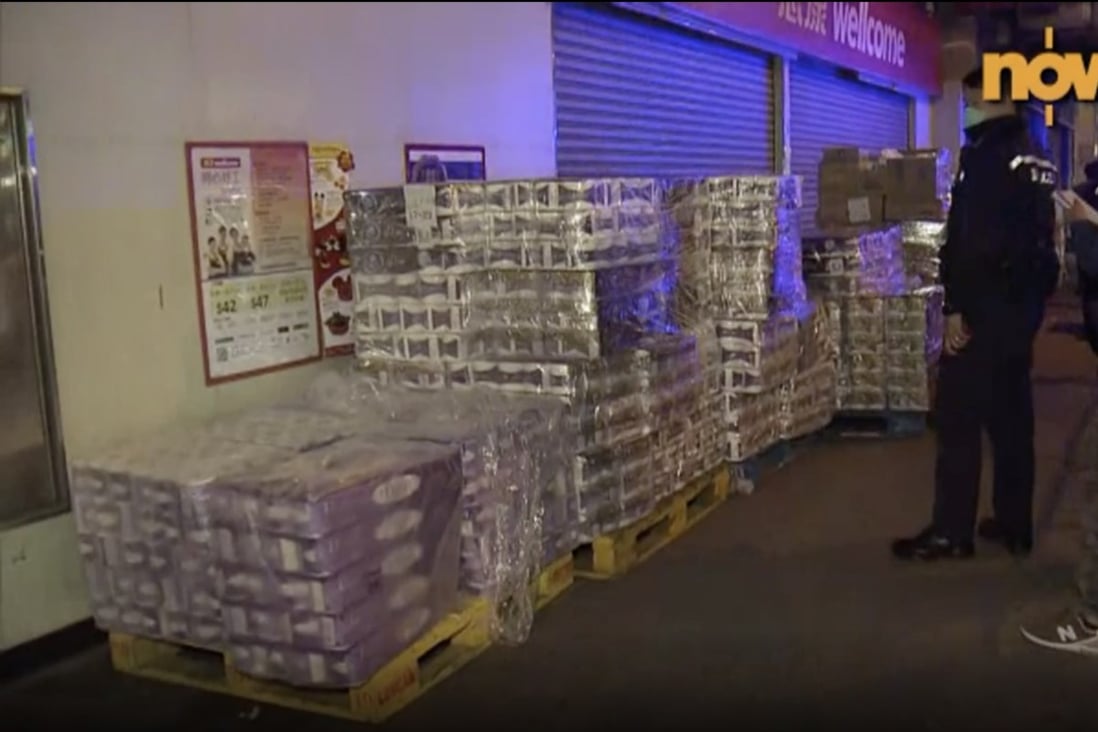 About 600 rolls of toilet paper were stolen from outside a supermarket in Mong Kok on Monday morning. Photo: Now TV