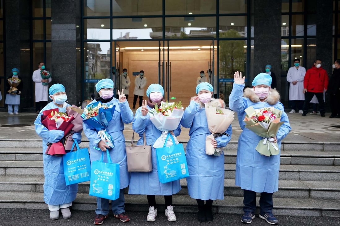 Twenty-three coronavirus patients were discharged from hospital on Thursday after treatment with both traditional Chinese medicine and Western medicine. Photo: Xinhua