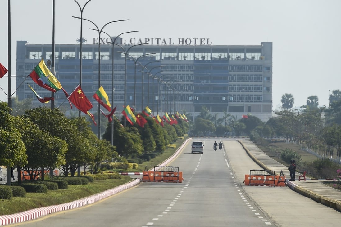 Chinese and Myanmar flags decorate lamp posts along a road in Naypyidaw ahead of the recent visit of Chinese President Xi Jinping to the Myanmar capital. The city may finally start coming to life soon, 15 years after it was built. Photo: AFP