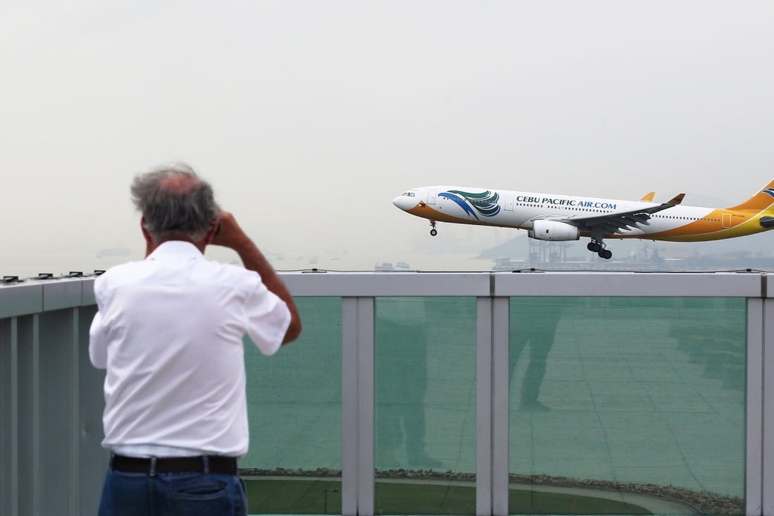 A Cebu Pacific Air passenger plane lands at Hong Kong International Airport. Photo: Handout