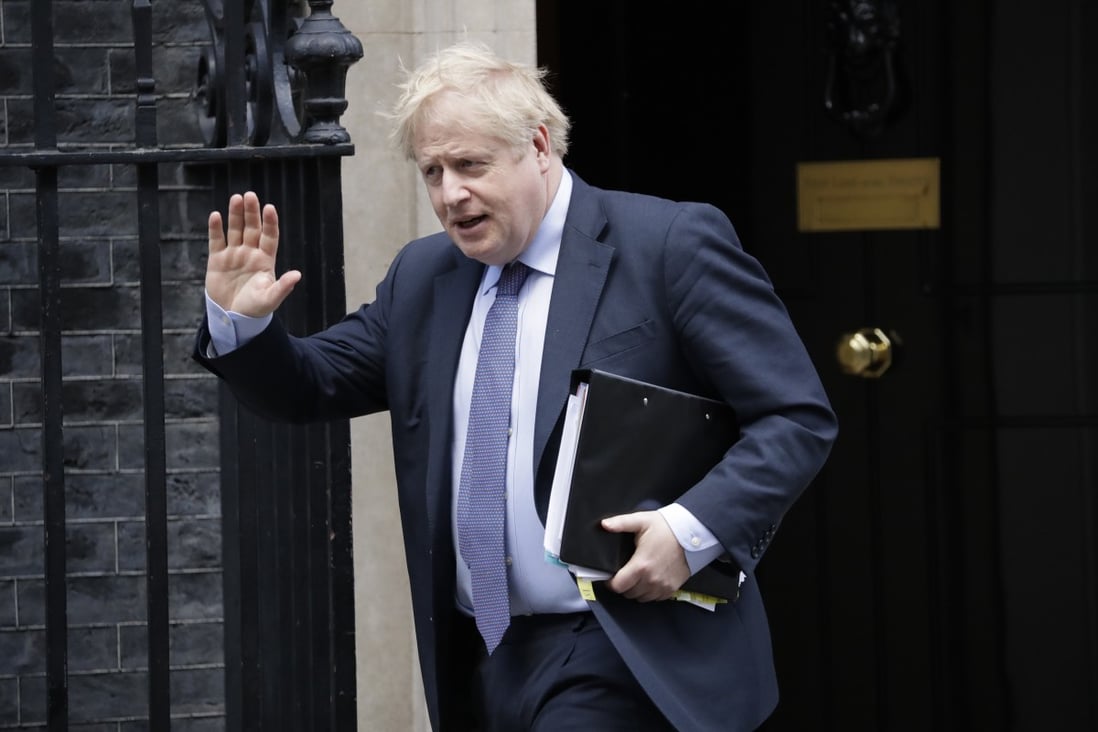 British Prime Minister Boris Johnson leaves 10 Downing Street in London on February 12. Photo: AP