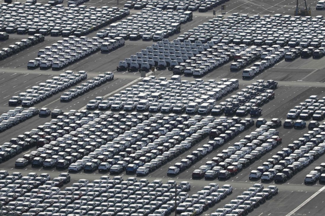 Rows of Hyundai cars are parked for shipping in the southeastern port of Ulsan in South Korea. Hyundai has suspended work at a factory in Ulsan, hamstrung by a lack of parts as the coronavirus outbreak cripples China’s industrial output. Photo: AFP