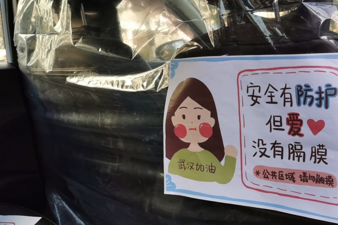 Didi Chuxing is rolling out a programme to install protective plastic dividers between the passenger and driver seats in millions of cars on its ride-hailing platform. Photo: Handout