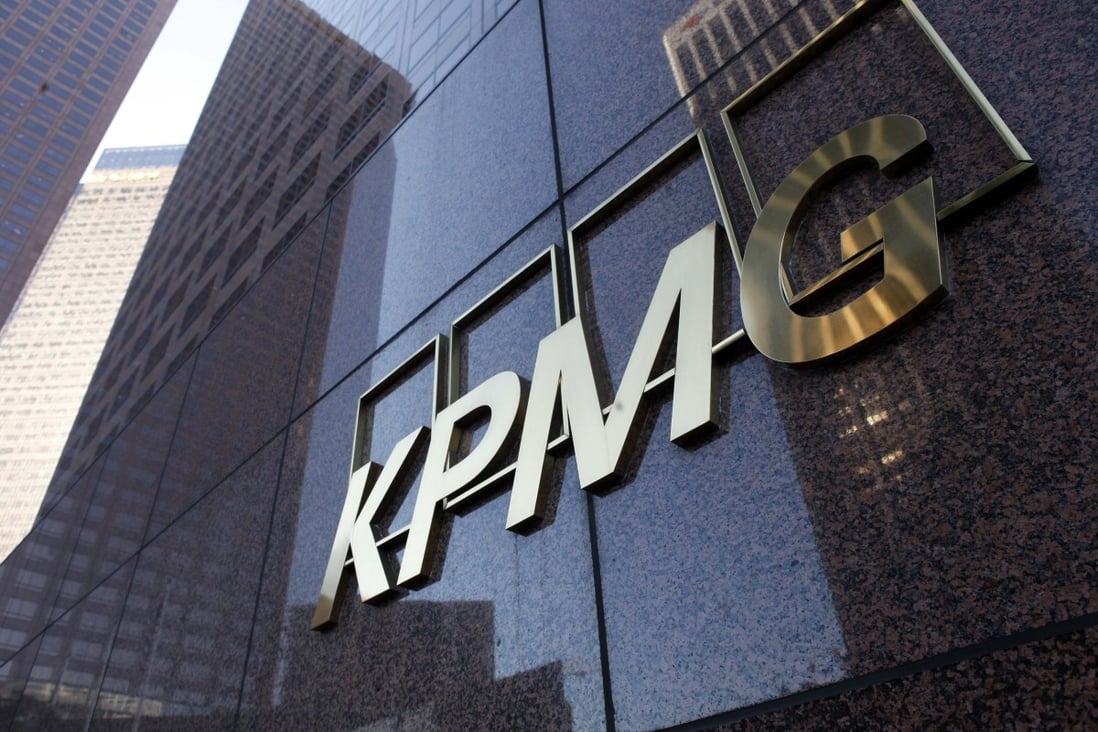 The street-level sign of the KPMG building in downtown Los Angeles on April 10, 2013. Photo: Reuters