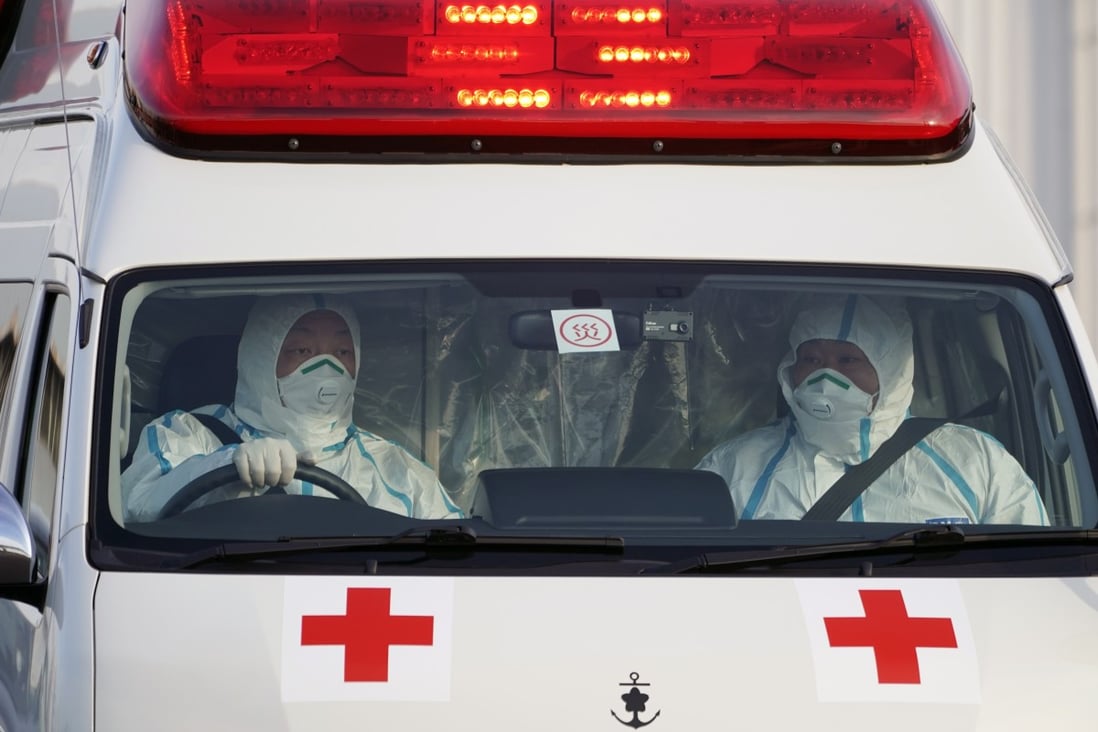 An ambulance in Japan transports a Diamond Princess cruise passenger infected with the coronavirus. Photo: EPA